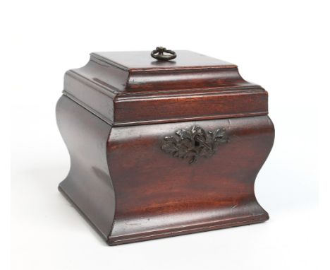 A George III mahogany square ogee tea caddy. With brass loop handle, pagoda shaped cover opening to reveal two compartments a