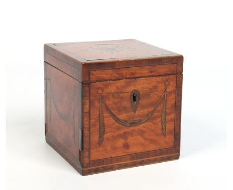 A George IV square satinwood tea caddy. With rosewood banding, marquetry inlaid ribbon swags and shell motif and with acanthu
