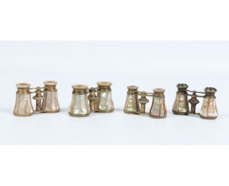 Four pairs of mother of pearl mounted opera glasses. Condition Report. To be used as a guide only. All lenses and scales in g