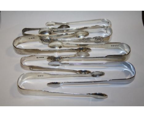 EIGHT PAIRS OF HALLMARKED SILVER SUGAR TONGS OF VARIOUS DATES AND MAKERS 