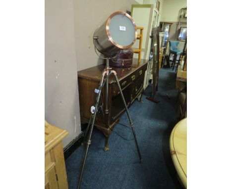 A MODERN INDUSTRIAL STYLE TRIPOD FLOORSTANDING LAMP