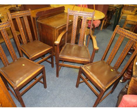 A SET OF FOUR VINTAGE OAK DINING CHAIRS 