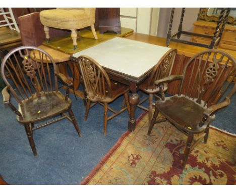 A VINTAGE OAK DRAWLEAF TABLE WITH FORMICA TOP AND FOUR WHEELBACK CHARS