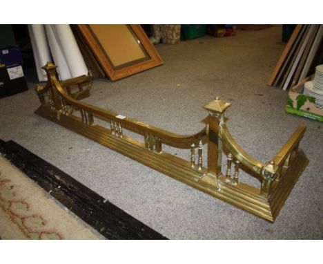 A VINTAGE BRASS FIRE FENDER, W 134 CM