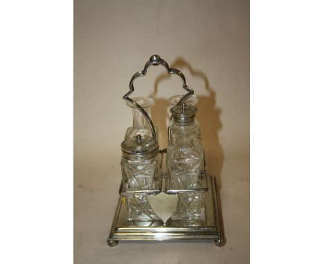 A SILVER PLATED FOUR BOTTLE CRUET SET, A/F