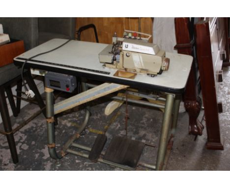 A VINTAGE MARK IV UNION SPECIAL INDUSTRIAL SEWING MACHINE