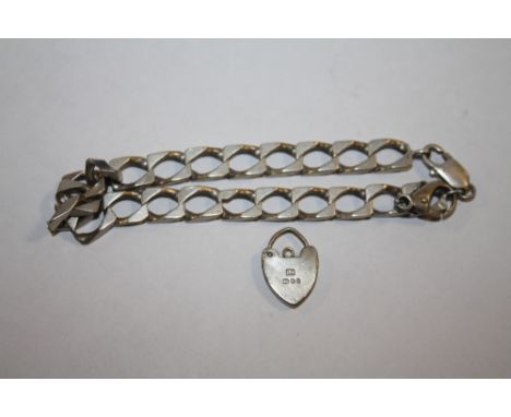 A STERLING SILVER FLAT LINK BRACELET TOGETHER WITH A HALLMARKED SILVER HEART LOCK, COMBINED WEIGHT 27.7 G