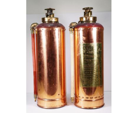 Two vintage simplex fire extinguishers copper and brass