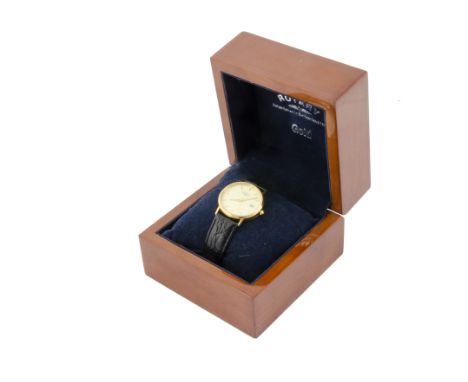 A modern Rotary 18ct gold cased gentleman's wristwatch, 32mm case, batons to cream dial with date window, manual wind, appear