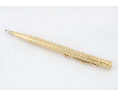 A c1940s Yard-O-Led 9ct gold propelling pencil, engine turned body, engarved H.D. Ward, 20g 