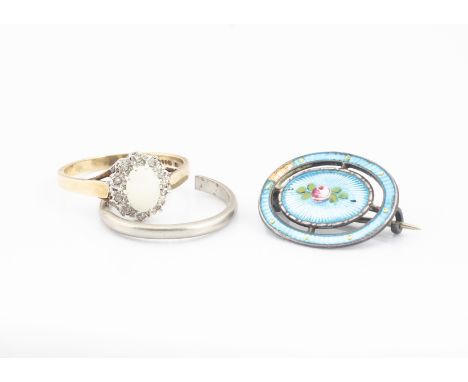 A Charles Horner silver and enamel oval brooch, dated Chester 1914 (af to enamel), a platinum wedding band, 2.9g (af) and an 