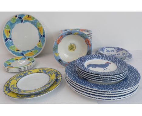 Small sets of colourful modern crockery:a set of twelve Gien 'Belle-Ile' 18cm bowls (1 chip noted);a set of Steelite Internat