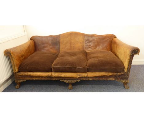 A good early 20th century brown-leather upholstered three-seater sofa on carved animal's paw-style front legs (approx. 190cm 