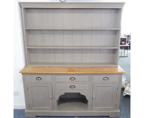 A good and modern shabby-chic-style dresser: the shelved superstructure above an arrangement of four drawers and panelled cup