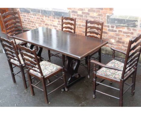 Reproduction refectory style dining table and six ladder-back chairs (2 carvers). Condition report: see terms and conditions