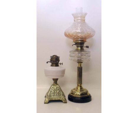 Victorian corinthian column oil lamp with glass bowls and smaller later lamp. Condition report: see terms and conditions