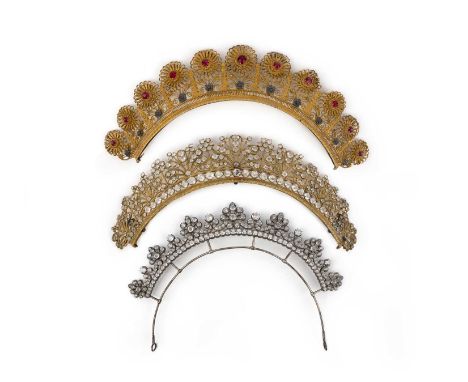 Three hair ornaments, 19th century, comprising: a tiara set with colourless pastes, to a steel frame, inner curve of frame 25