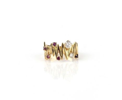 A ruby and diamond ring, the front of zig-zag design, set with circular-cut rubies and brilliant-cut diamonds, mounted in gol