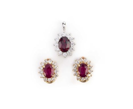 A pair of ruby and diamond ear clips and a garnet and diamond pendant, each of cluster design, the ear clips each composed of