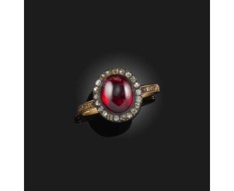 A garnet and diamond mourning ring, late 18th century, set with a cabochon garnet within a border of cushion-shaped diamonds,