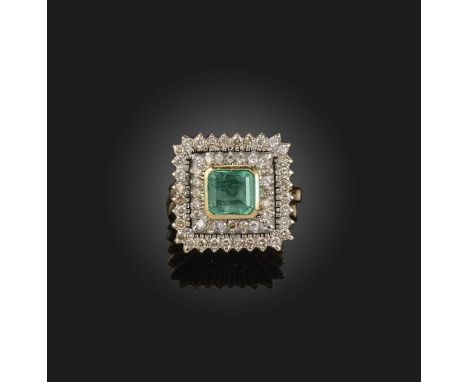 An emerald and diamond ring, designed as a cluster of square outline, collet-set with a step-cut emerald, within a double bor