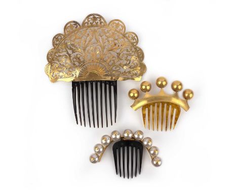 λ Three gilt metal and tortoiseshell hair combs, 19th century, comprising: a hair comb of fanned outline, in foliate gilt met