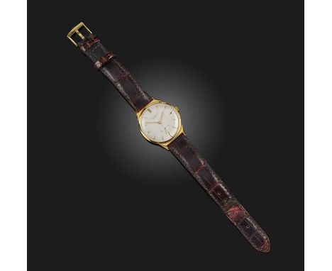 Patek Philippe, a gentleman's gold wristwatch, signed dial with baton numerals and subsidiary seconds dial, manual movement, 