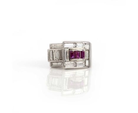 An Art Deco ruby and diamond ring, circa 1935, of ridged geometric design, set with baguette diamonds and a line of calibré-c