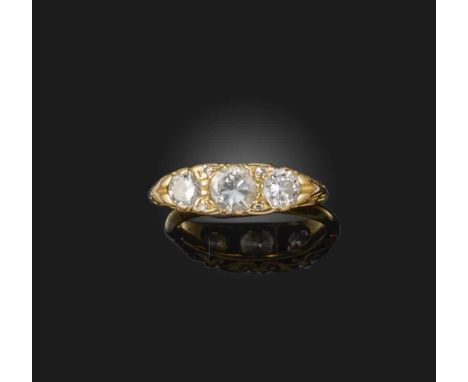 No reserve - A diamond ring, of half-hoop design, set with three brilliant-cut diamonds totalling approximately 0.80 carats, 