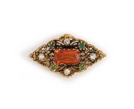 A fire opal, emerald and diamond brooch, of lozenge-shaped outline in foliate gold openwork, set with an elongated cushion-sh