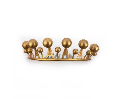 A gilt metal hair ornament, 19th century, designed as a tiara, decorated with spikes capped with gilt metal spheres, to a hin