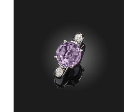 An amethyst and diamond ring, claw-set with a circular-cut amethyst, to shoulders set with marquise-shaped diamonds, mounted 