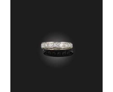 A diamond full-circle eternity ring, set with round brilliant-cut diamonds in platinum, size M