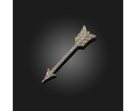 A diamond brooch, early 20th century, designed as an arrow, set with rose-cut diamonds, mounted in gold and platinum, length 