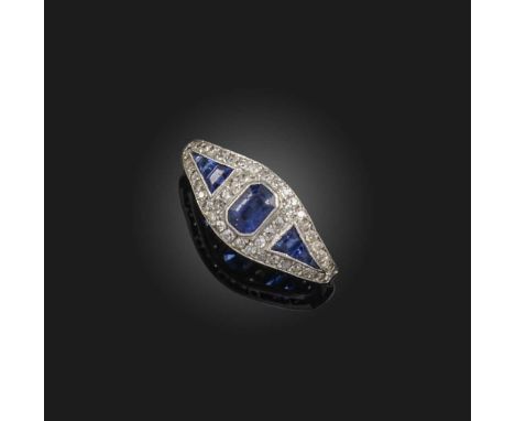 An Art Deco sapphire and diamond ring, France, 1920s, collet-set with a step-cut sapphires, to shoulders set with calibré-cut