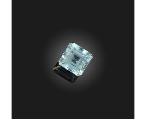 An aquamarine solitaire ring, the large square step-cut aquamarine is claw-set in white gold, size K