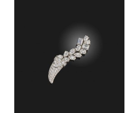 A diamond brooch, designed as a cornucopia, set with brilliant-cut, oval, step-cut, marquise- and pear-shaped diamonds, lengt