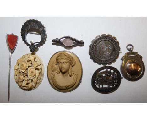 A Chinese carved ivory panel, a lava cameo brooch and various silver brooches