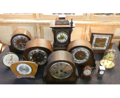 An anniversary clock together with six oak cased mantle clocks, a Swiza swiss made mantle clock amongst other small clocks (2