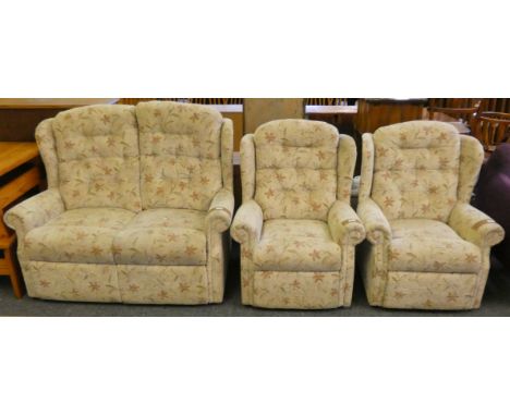 A three piece cottage style suite consisting of a two seater sofa and a pair of matching armchairs (3)