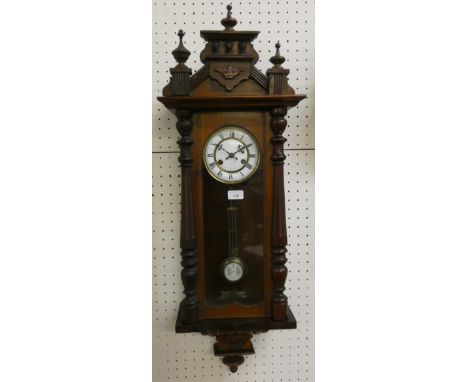 A Vienna style manual wind wall clock