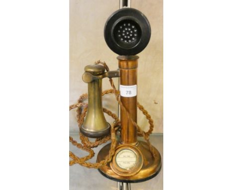 An early 20th century brass stick telephone, with Bakelite mouth and earpiece, height 31cm