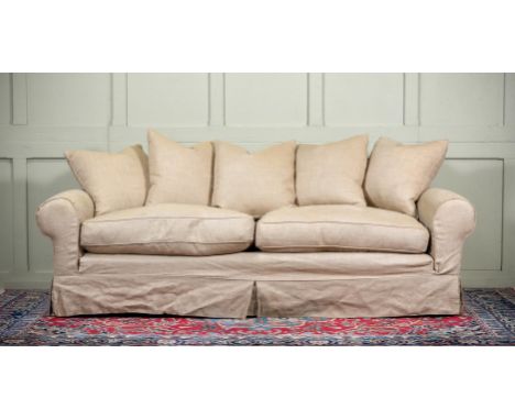AN UPHOLSTERED SOFA MODERN With natural linen type fabric loose cover, seat cushions and matching scatter cushions approximat