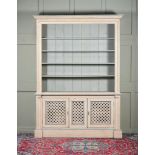 A CREAM PAINTED CABINET BOOKCASE IN 19TH CENTURY STYLE