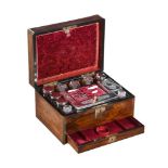Y A VICTORIAN WALNUT AND SILVER COLOURED METAL TRAVELLING GROOMING SET