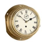 A VICTORIAN BRASS SHIP’S BULKHEAD TIMEPIECE