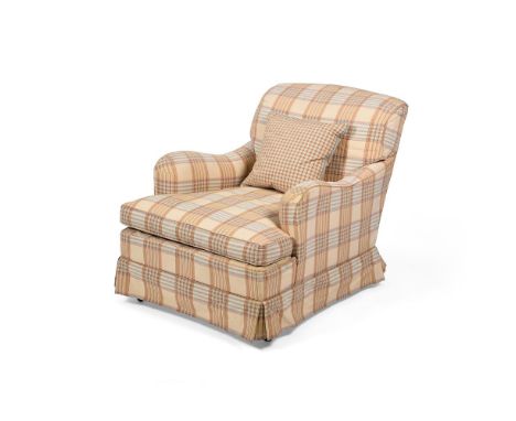 A BEECH AND UPHOLSTERED EASY ARMCHAIR  BY HOWARD & SONS, EARLY 20TH CENTURY With stamped rear castors, one rear leg stamped '