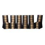 A SET OF TWELVE SILK UPHOLSTERED HIGH BACK DINING CHAIRS