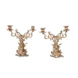 A PAIR OF FRENCH GILT METAL FIGURAL CANDLESTICKS
