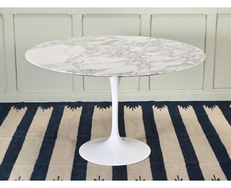 EERO SAARINEN (1910-1961) FOR KNOLL INTERNATIONAL, A 'TULIP' DINING TABLE  LATE 20TH CENTURY  With circular marble top, the u
